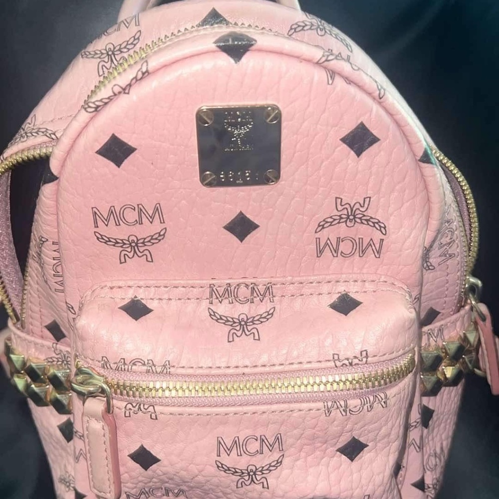 Authentic MCM x studded mini backpack